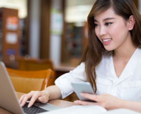 student working on a laptop